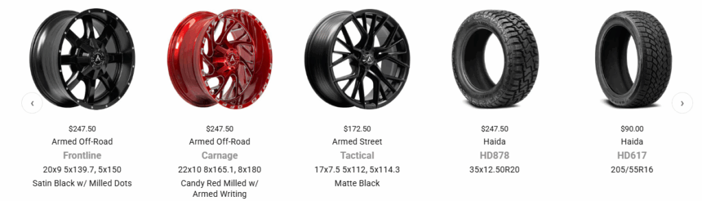 Technician placing a car wheel on a balancing machine to correct tire imbalance.
