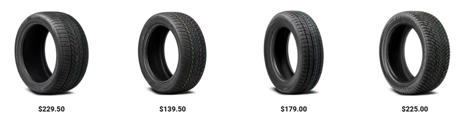 Mechanic changing summer tires to winter tires on a car before the winter season.