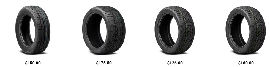 Close-up of winter tire installation on a vehicle during seasonal tire change.