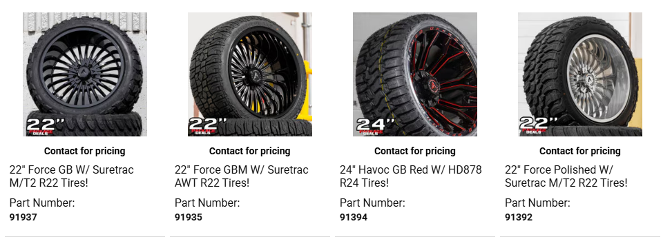 Mechanic installing a full set of new tires on a vehicle in an auto shop showing tire purchase and installation service.