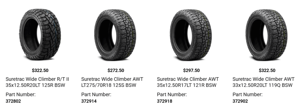 Pickup truck driving on a gravel road with all-terrain tires designed for traction and durability.