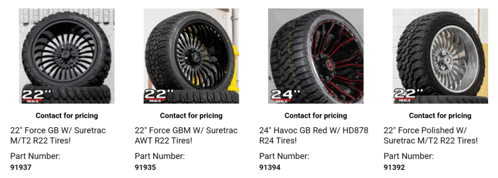 Set of new tires and alloy rims displayed together showing complete wheel and tire package price.