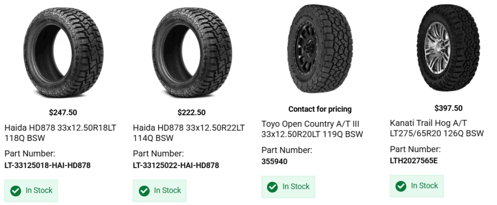 Ford F-150 with aggressive all-terrain tires and aftermarket wheels driving in Canadian terrain