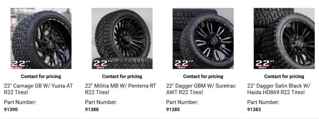 Lifted truck with aftermarket wheels and all-terrain tires creating aggressive stance